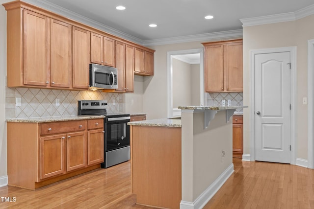1012 Palace Garden Way, Raleigh, NC 27603 - kitchen featuring stainless steel appliances, light wood finished floors, light stone counters, backsplash, and a kitchen breakfast bar