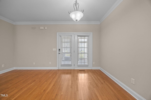 1012 Palace Garden Way, Raleigh, NC 27603 - empty room featuring crown molding and light wood-style floors