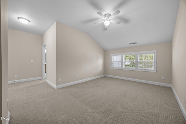1012 Palace Garden Way, Raleigh, NC 27603 - unfurnished room with vaulted ceiling, a ceiling fan, and carpet