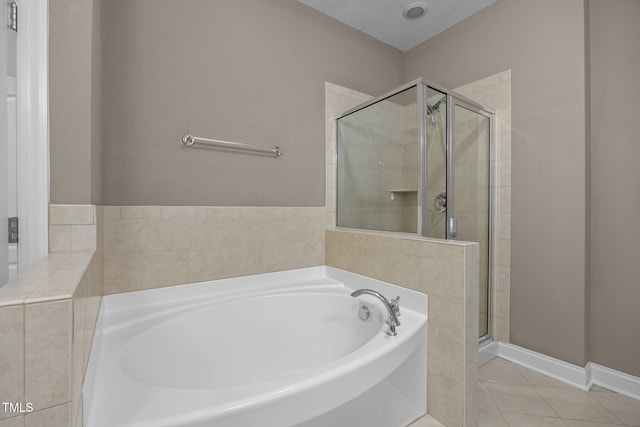 1012 Palace Garden Way, Raleigh, NC 27603 - full bathroom with a bath, a shower stall, and tile patterned flooring