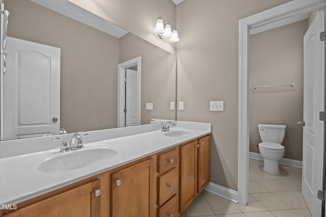 1012 Palace Garden Way, Raleigh, NC 27603 - full bathroom with double vanity and tile patterned floors