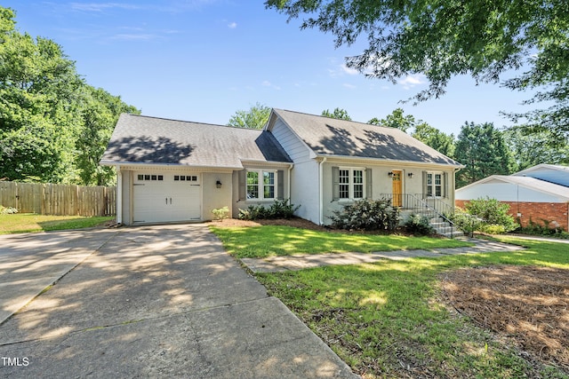 405 E Millbrook Rd, Raleigh, NC 27609 - view of front of property featuring driveway, a garage, and roof with shingles