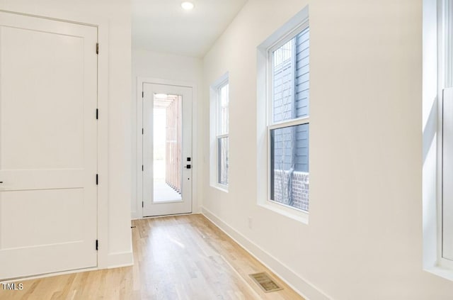322 S Dixon Ave Unit R, Cary, NC 27511 - foyer entrance with light wood finished floors and baseboards