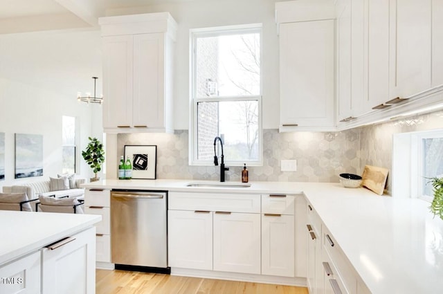 322 S Dixon Ave Unit R, Cary, NC 27511 - kitchen with dishwasher, light countertops, and white cabinets