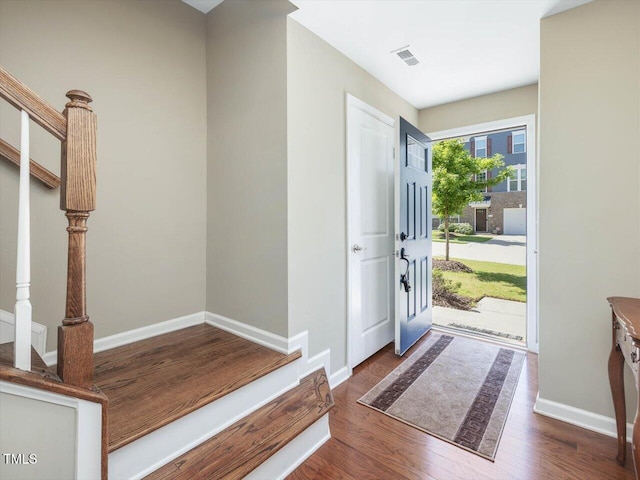 215 Brier Summit Pl, Durham, NC 27703 - entryway with wood finished floors and stairway
