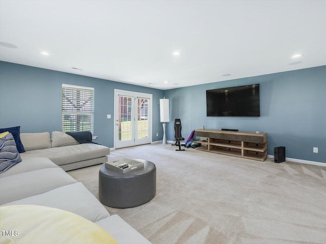 215 Brier Summit Pl, Durham, NC 27703 - living area featuring carpet flooring, french doors, and recessed lighting