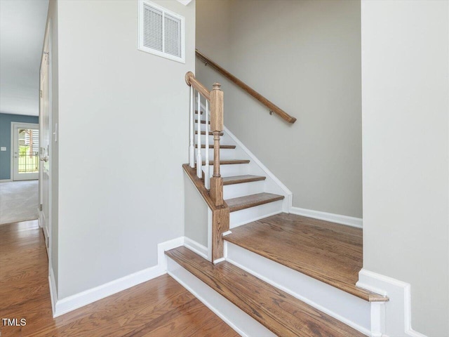 215 Brier Summit Pl, Durham, NC 27703 - stairway featuring wood finished floors and baseboards