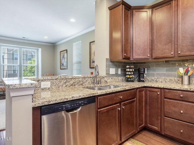 215 Brier Summit Pl, Durham, NC 27703 - kitchen with dishwasher, ornamental molding, a peninsula, light stone countertops, and light wood-style flooring