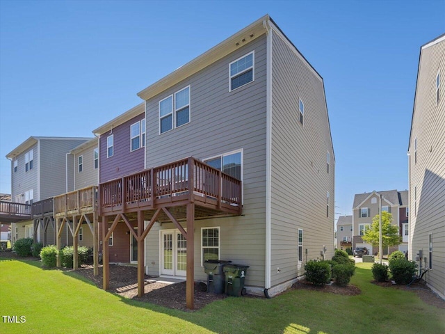215 Brier Summit Pl, Durham, NC 27703 - rear view of house featuring a yard, a wooden deck, and a residential view