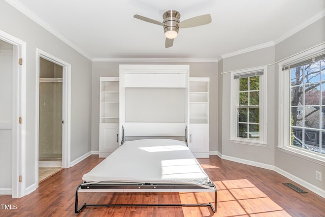 112 Solstice Cir, Cary, NC 27513 - bedroom featuring wood finished floors, ornamental molding, and a ceiling fan