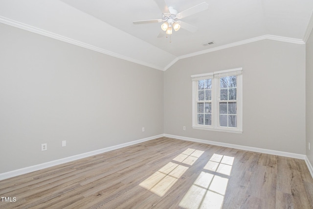 112 Solstice Cir, Cary, NC 27513 - spare room with lofted ceiling, crown molding, light wood-style floors, and ceiling fan