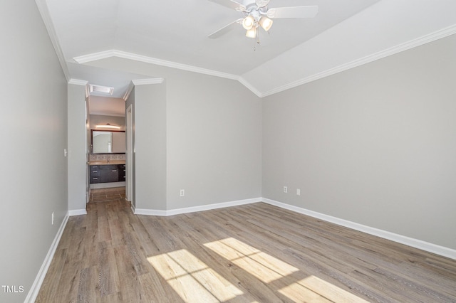 112 Solstice Cir, Cary, NC 27513 - unfurnished room featuring lofted ceiling, ornamental molding, light wood-style flooring, and ceiling fan