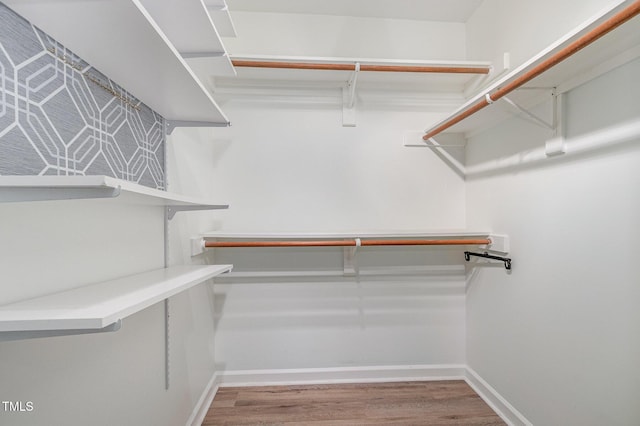 112 Solstice Cir, Cary, NC 27513 - spacious closet featuring wood finished floors