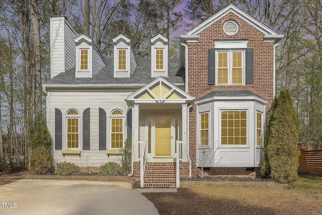 112 Solstice Cir, Cary, NC 27513 - view of front facade with a chimney and a shingled roof