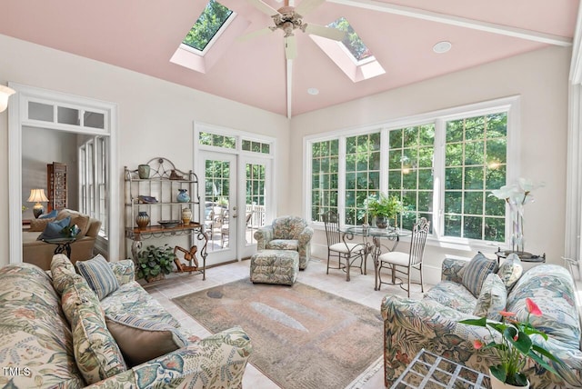 3606 Dairy Pond Pl, Durham, NC 27705 - tiled living room featuring a skylight, plenty of natural light, vaulted ceiling, and ceiling fan