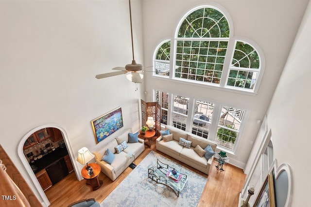 3606 Dairy Pond Pl, Durham, NC 27705 - living area with a towering ceiling, wood finished floors, and ceiling fan