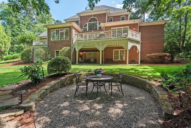 3606 Dairy Pond Pl, Durham, NC 27705 - rear view of property with brick siding, a yard, and a patio area