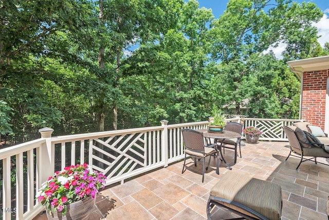 3606 Dairy Pond Pl, Durham, NC 27705 - view of patio featuring outdoor dining area and view of wooded area