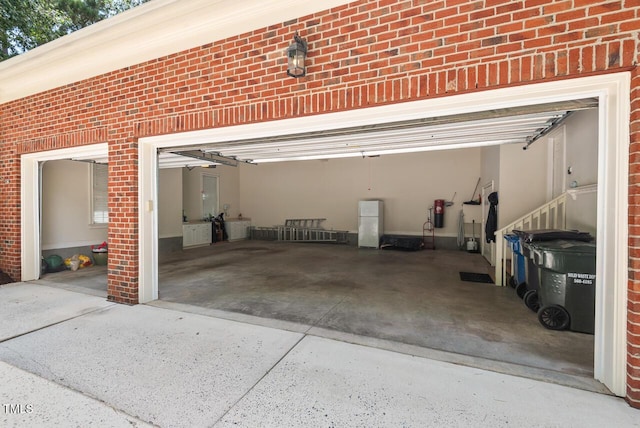 3606 Dairy Pond Pl, Durham, NC 27705 - garage with concrete driveway and a central vacuum unit