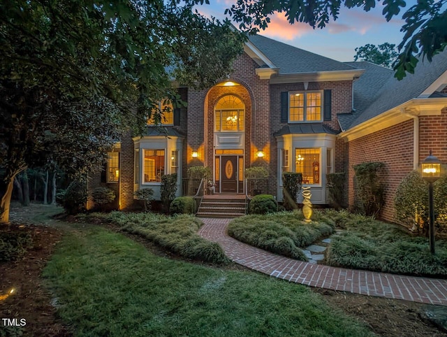 3606 Dairy Pond Pl, Durham, NC 27705 - colonial house featuring brick siding and roof with shingles