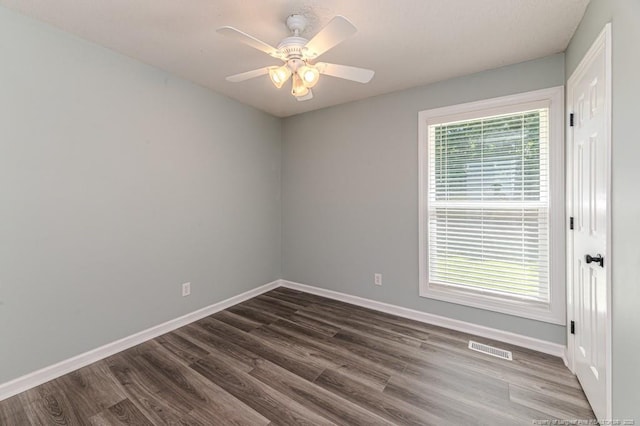 4101 Carson Dr, Sanford, NC 27332 - spare room featuring dark wood-style flooring and ceiling fan