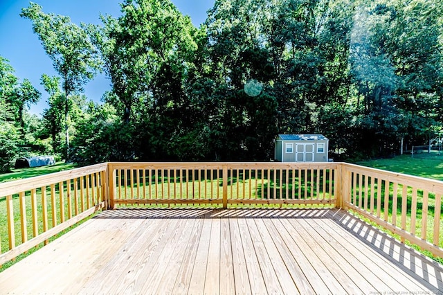 4101 Carson Dr, Sanford, NC 27332 - deck featuring a shed, a yard, and view of scattered trees