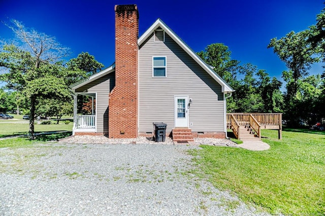 4101 Carson Dr, Sanford, NC 27332 - back of house with a chimney, crawl space, a yard, a wooden deck, and entry steps