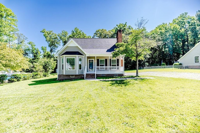 4101 Carson Dr, Sanford, NC 27332 - view of front of property featuring crawl space, covered porch, and a chimney