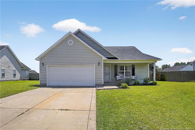 167 Westminster Dr, Raeford, NC 28376 - ranch-style house with covered porch, concrete driveway, and an attached garage