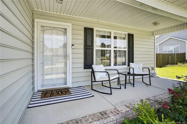 167 Westminster Dr, Raeford, NC 28376 - doorway to property featuring covered porch