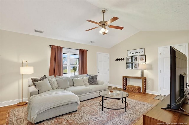 167 Westminster Dr, Raeford, NC 28376 - living room with ceiling fan, light wood-style floors, and vaulted ceiling