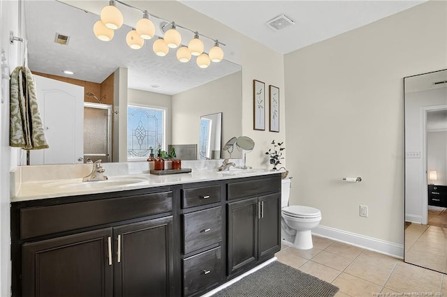 167 Westminster Dr, Raeford, NC 28376 - full bathroom with tile patterned flooring, double vanity, and a stall shower