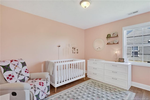 167 Westminster Dr, Raeford, NC 28376 - bedroom featuring wood finished floors and baseboards
