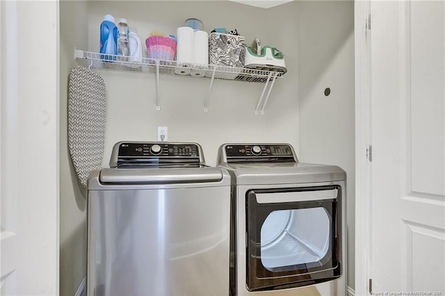 167 Westminster Dr, Raeford, NC 28376 - laundry area with washer and clothes dryer