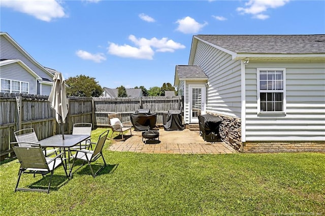 167 Westminster Dr, Raeford, NC 28376 - fenced backyard featuring a patio