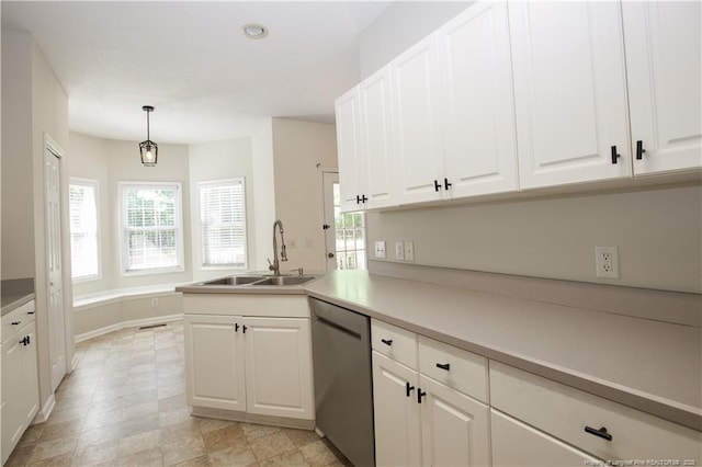130 Pinecone Ct, Seven Lakes, NC 27376 - kitchen featuring dishwasher, plenty of natural light, white cabinetry, a peninsula, and recessed lighting