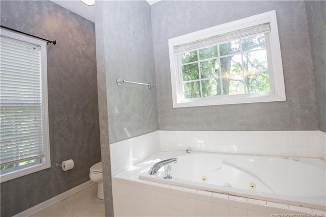 130 Pinecone Ct, Seven Lakes, NC 27376 - bathroom with healthy amount of natural light and a tub with jets