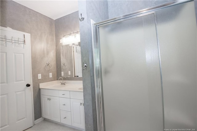 130 Pinecone Ct, Seven Lakes, NC 27376 - bathroom with double vanity and a stall shower