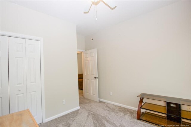 130 Pinecone Ct, Seven Lakes, NC 27376 - unfurnished bedroom with carpet, a closet, and ceiling fan