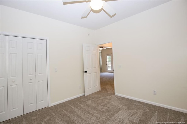 130 Pinecone Ct, Seven Lakes, NC 27376 - unfurnished bedroom featuring carpet, a closet, and a ceiling fan