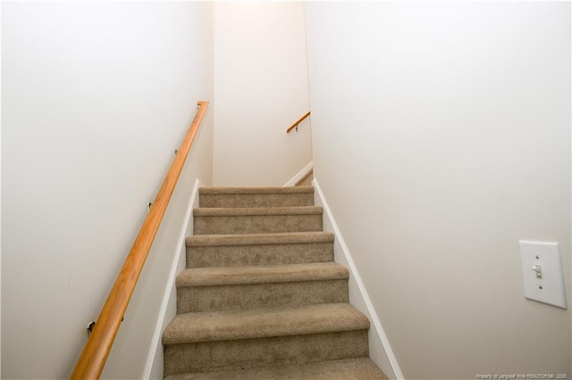 130 Pinecone Ct, Seven Lakes, NC 27376 - stairway with baseboards