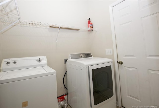 130 Pinecone Ct, Seven Lakes, NC 27376 - laundry area with washer and clothes dryer