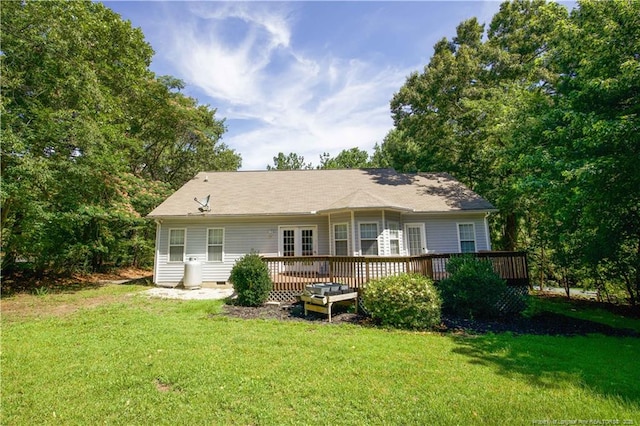 130 Pinecone Ct, Seven Lakes, NC 27376 - rear view of house with a wooden deck, a lawn, and crawl space