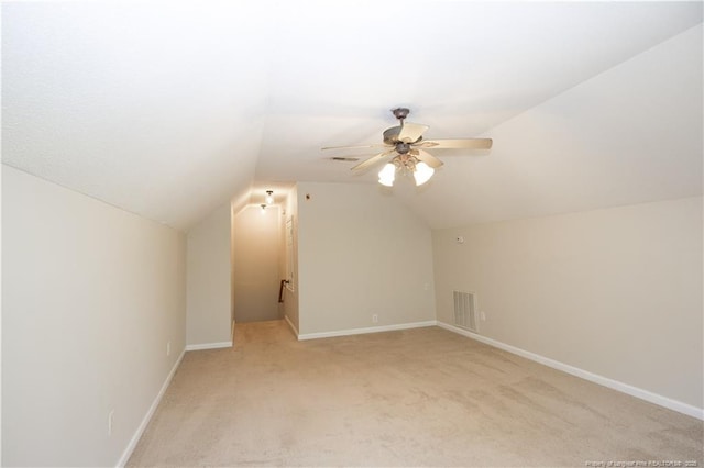 130 Pinecone Ct, Seven Lakes, NC 27376 - additional living space featuring light carpet, vaulted ceiling, and ceiling fan