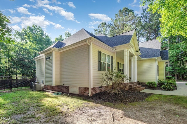 15 Cole Creek Way, Franklinton, NC 27525 - view of side of home featuring roof with shingles and crawl space