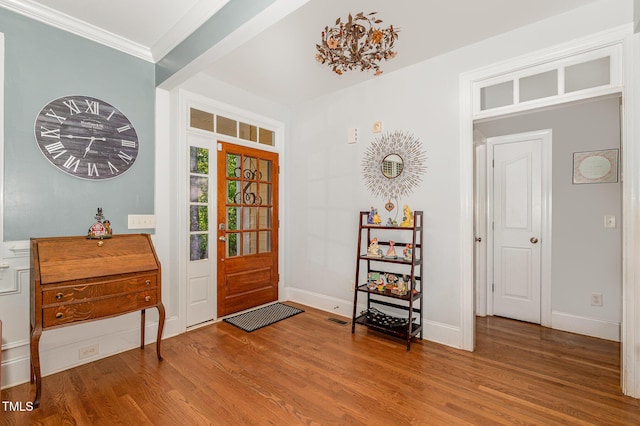 15 Cole Creek Way, Franklinton, NC 27525 - entrance foyer featuring wood finished floors and crown molding