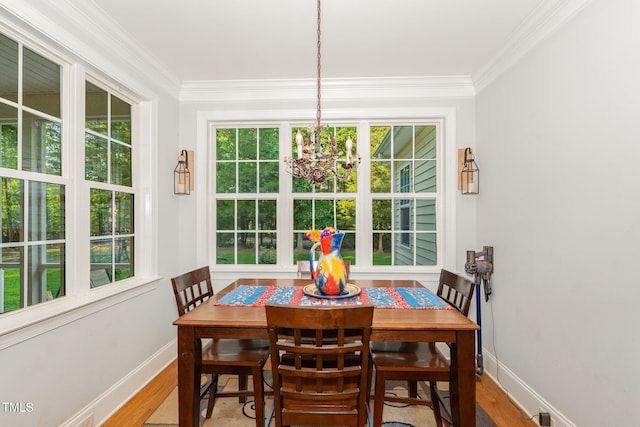 15 Cole Creek Way, Franklinton, NC 27525 - dining space with a chandelier, wood finished floors, and crown molding