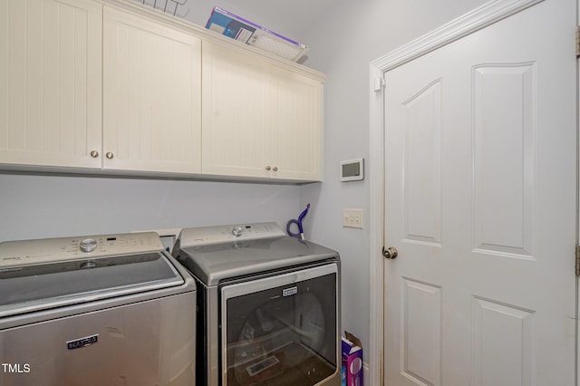 15 Cole Creek Way, Franklinton, NC 27525 - laundry room with cabinet space and washer and clothes dryer