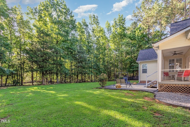 15 Cole Creek Way, Franklinton, NC 27525 - view of green lawn with ceiling fan and a patio area