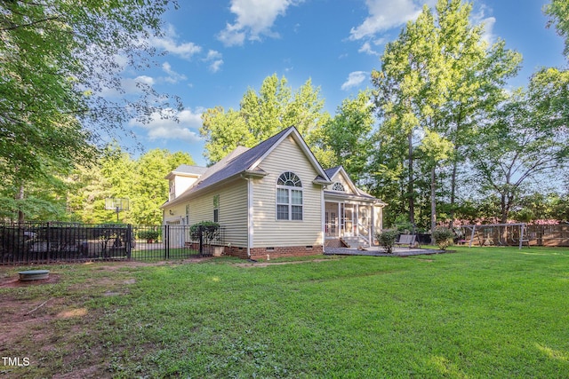 15 Cole Creek Way, Franklinton, NC 27525 - rear view of house featuring crawl space, a sunroom, and a fenced backyard